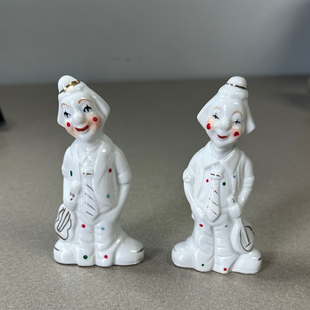 Whimsical White Porcelain Clown Figurines